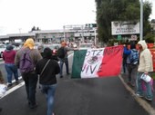 Estudiantes de la Universidad Pedagógica Nacional tomaron la caseta de peaje de la autopista México-Cuernavaca, como parte de las acciones de apoyo a los normalistas desaparecidos.