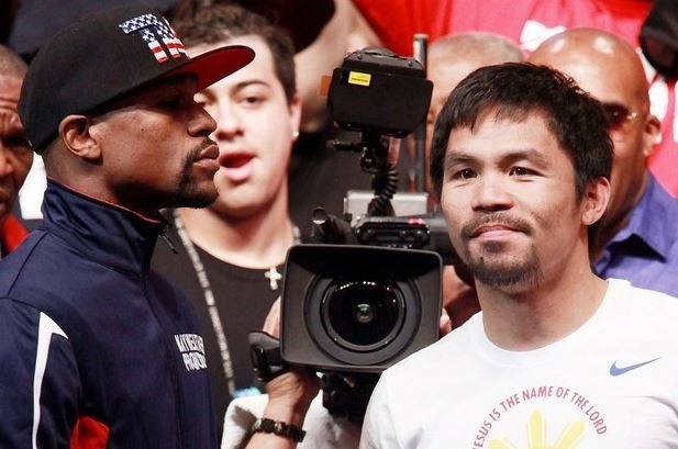 Floyd Mayweather (izquierda) y Manny Pacquiao en la ceremonia de pesaje. Foto Xinhua