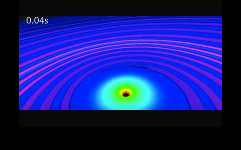 Imagen presentada durante la conferencia de Ligo. Dos hoyos negros hacen colisión y producen un nuevo hoyo negro (abajo, al centro) y las ondas gravitacionales.