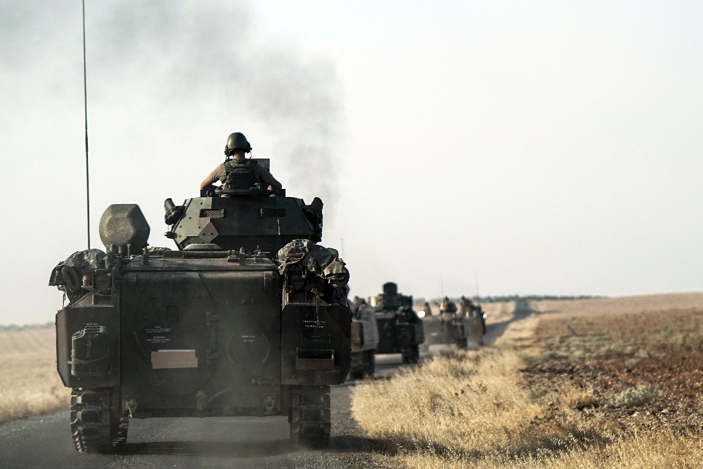 Convoy de tropas turcas se dirigen hacia Siria. Foto Ap