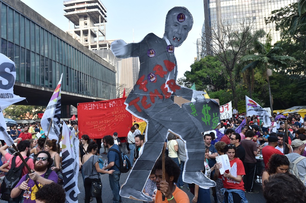 Unos 60 mil brasileños exigieron la renuncia del presidente, Michel Temer. Foto Afp